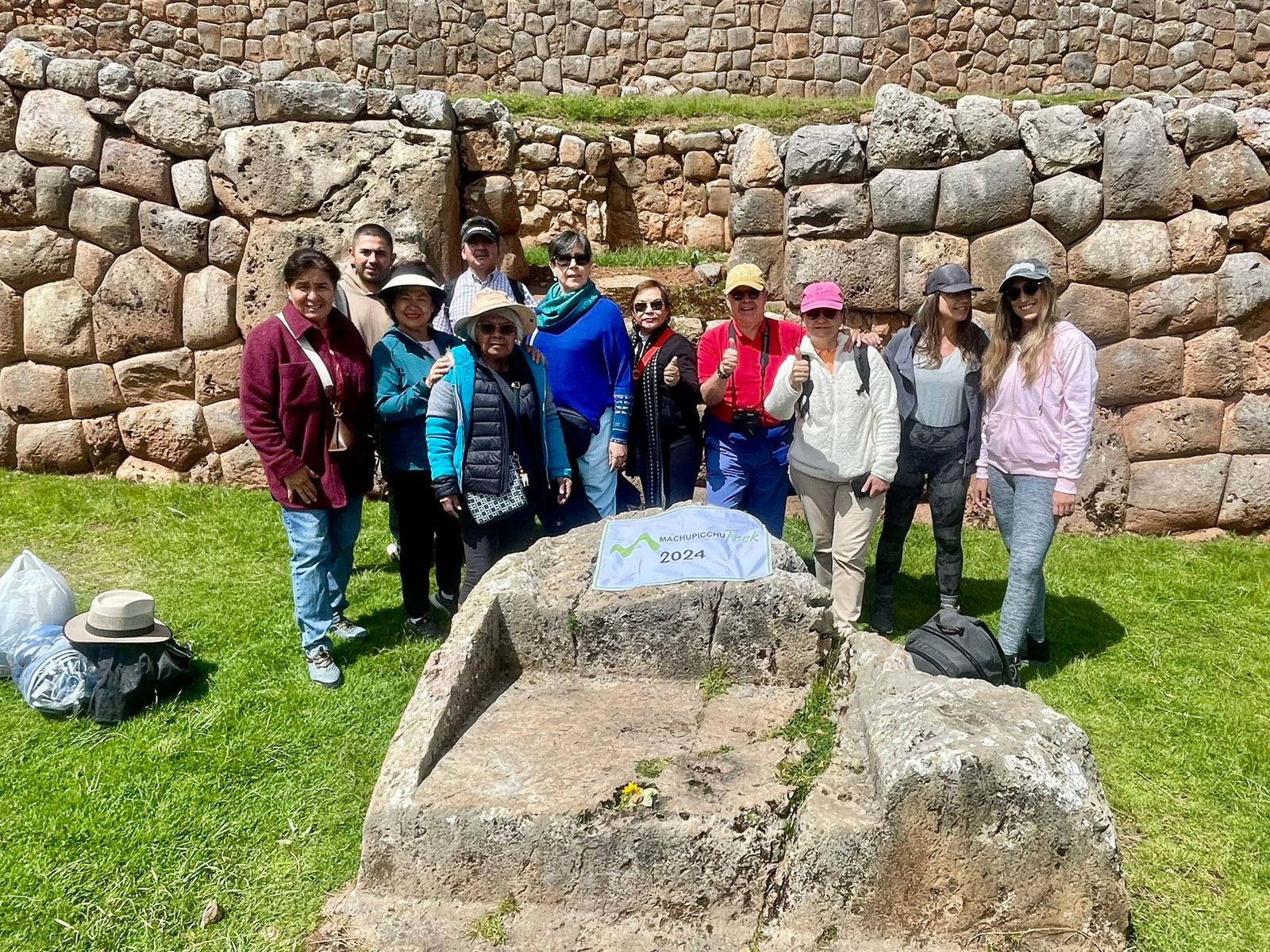 THOX4966 Group posing at Machu Picchu archaeological site