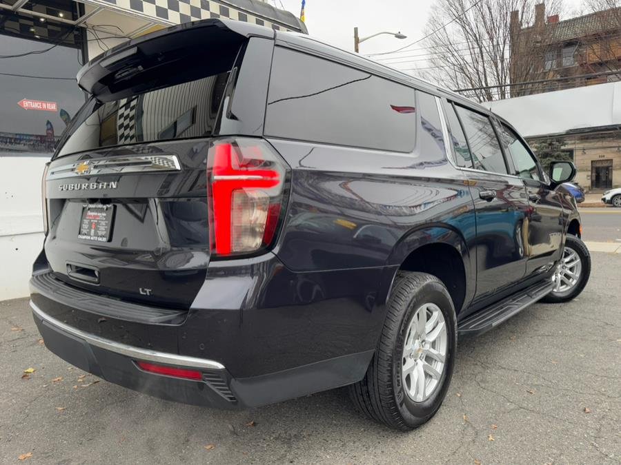 suburbam Black Chevrolet Suburban SUV parked outdoors
